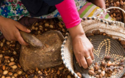 Woman crushing nuts